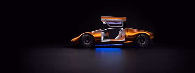 Oranžový Mercedes-Benz Vision One-Eleven z boku s otevřenými dveřmi vzhůru